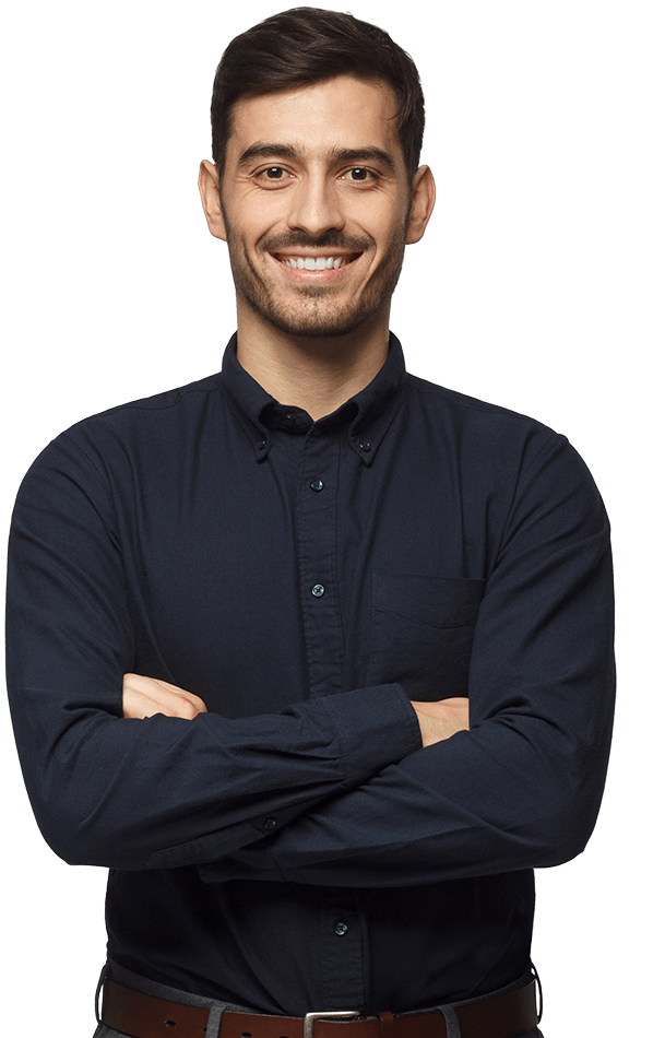 A man in business attire smiling at the camera