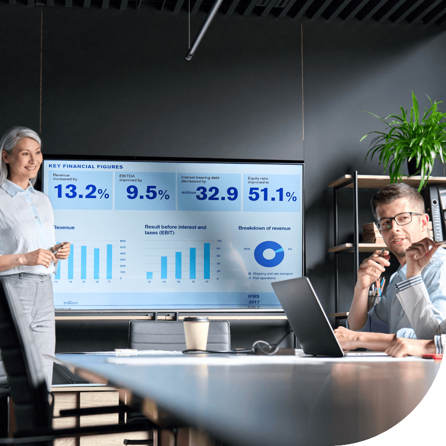 professional looking at numbers in board room